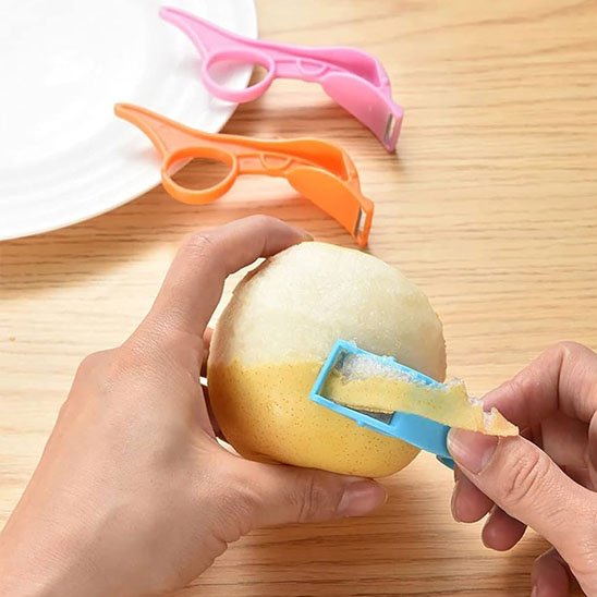 Eplucheur multifonction orange