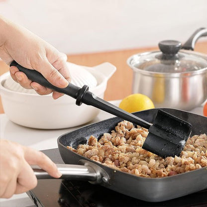 Hachoir a viande en utilisation avec un chef de cuisine