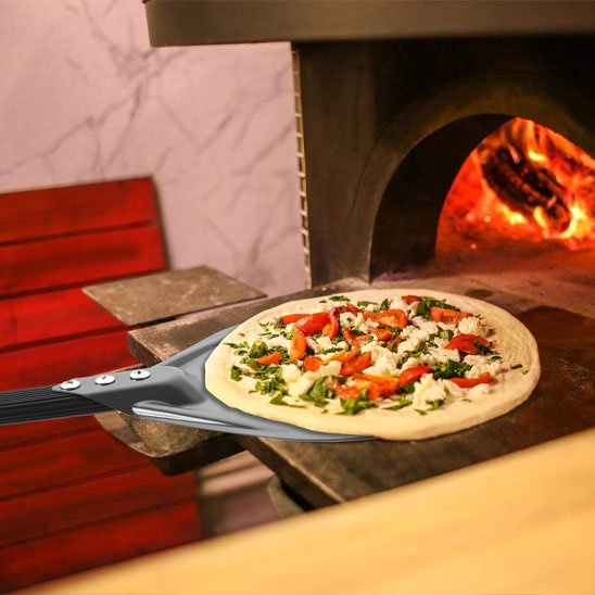 Pelle à pizza améliore la cuisson