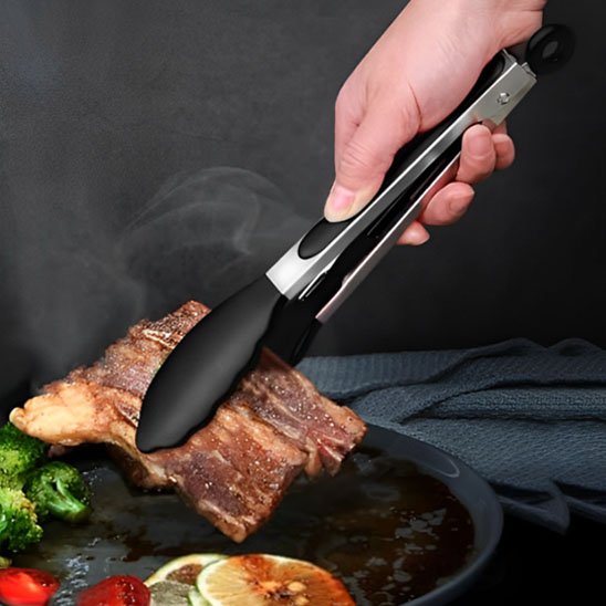 Pince de cuisine anti-chaleur pour steaks bbq