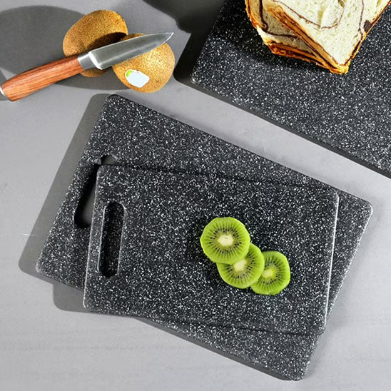 planche a decouper des kiwis sur la planche