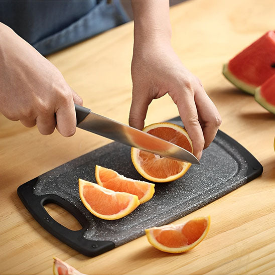 planche a decouper noir decoupe des oranges