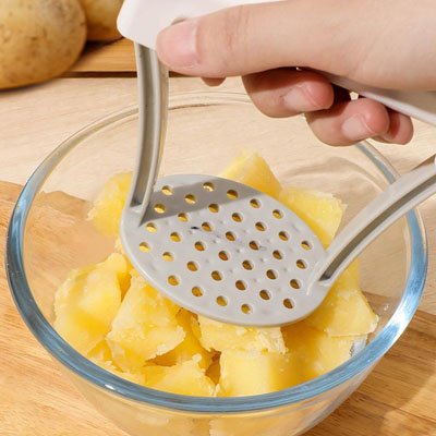 prese purée en utilisation manche robuste et horizontale